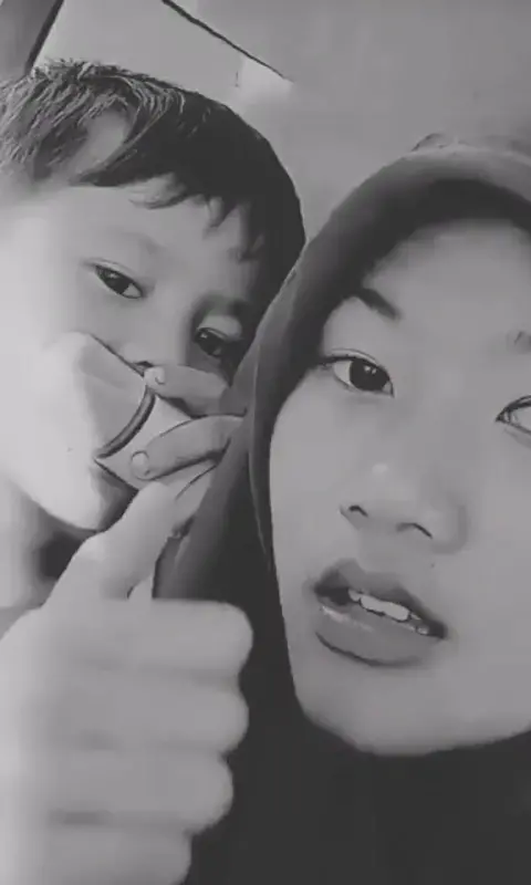 adult sister with young brother